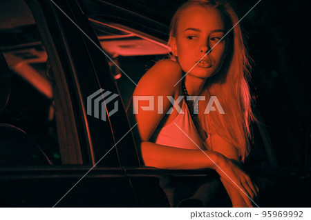 Night Passenger in a car 95969992