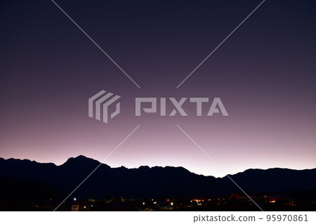 Hokuto City Hakushu town, Southern Alps, mountain ranges in silhouette and magic hour Hokuto City Hakushu town, Southern Alps, mountain ranges in silhouette and magic hour 95970861
