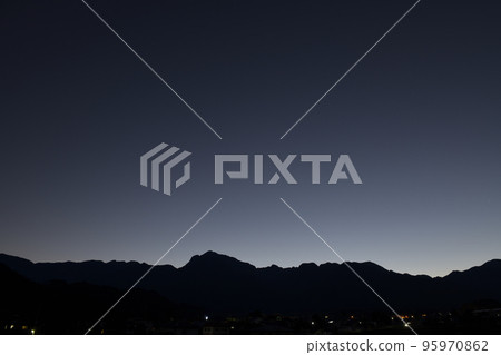 Hokuto City Hakushu town, Southern Alps, mountain ranges in silhouette and magic hour Hokuto City Hakushu town, Southern Alps, mountain ranges in silhouette and magic hour 95970862