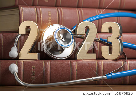 2023 Happy New Year for health care medicine and pharmacy industry. Number 2023 with stethoscope on vintage books of medicine. 95970929