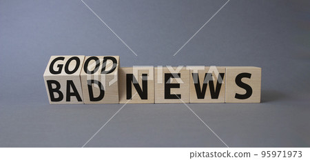 Good news and Bad news symbol. Turned wooden cubes with words Bad news and Good news. Beautiful grey background. Business concept. Copy space Good news and Bad news symbol. Turned wooden cubes with words Bad news and Good news. Beautiful grey background. Business concept. Copy space 95971973