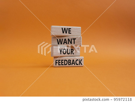 We want your feedback symbol. Wooden blocks with words We want your feedback. Beautiful orange background. We want your feedback concept. Copy space. 95972118