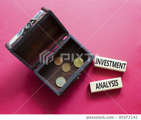 investment analysis symbol. Wooden blocks with words 'investment analysis' with wooden box. Beautiful red background. Business and 'investment analysis' concept. Copy space. investment analysis symbol. Wooden blocks with words 'investment analysis' with wooden box. Beautiful red background. Business and 'investment analysis' concept. Copy space. 95972142