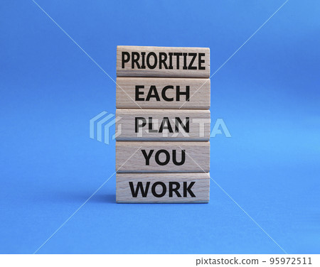 Priority, plan and work symbol. Wooden blocks with words Prioritize each plan you work. Beautiful blue background. Business and Prioritize each plan you work concept. Copy space Priority, plan and work symbol. Wooden blocks with words Prioritize each plan you work. Beautiful blue background. Business and Prioritize each plan you work concept. Copy space 95972511
