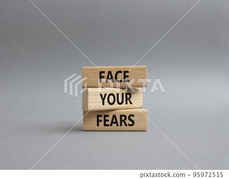 Face your Fears symbol. Wooden blocks with words Face your Fears. Beautiful grey background. Business and Face your Fears. Copy space. Face your Fears symbol. Wooden blocks with words Face your Fears. Beautiful grey background. Business and Face your Fears. Copy space. 95972515