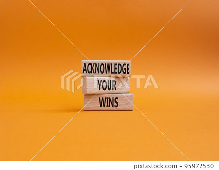 Acknowledge your wins symbol. Concept words Acknowledge your wins on wooden blocks. Beautiful orange background. Business and Acknowledge your wins concept. Copy space Acknowledge your wins symbol. Concept words Acknowledge your wins on wooden blocks. Beautiful orange background. Business and Acknowledge your wins concept. Copy space 95972530