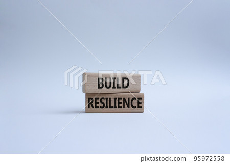 Build resilience symbol. Wooden blocks with words Build resilience. Beautiful white background. Business and Build resilience concept. Copy space. 95972558
