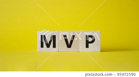 MVP symbol. Wooden cubes with words MVP. Beautiful yellow background. Business and MVP concept. Copy space. MVP symbol. Wooden cubes with words MVP. Beautiful yellow background. Business and MVP concept. Copy space. 95972590