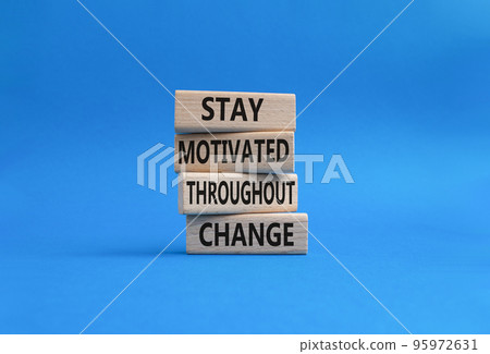 stay motivated throughout change symbol. Concept words stay motivated throughout change on wooden blocks. Beautiful blue background. Business and stay motivated throughout change concept. Copy space. stay motivated throughout change symbol. Concept words stay motivated throughout change on wooden blocks. Beautiful blue background. Business and stay motivated throughout change concept. Copy space. 95972631