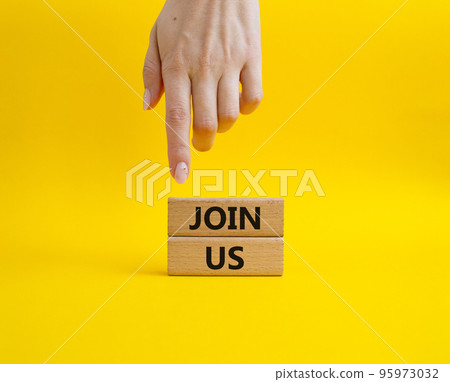 Join us symbol. Concept word Join us on wooden blocks. Beautiful yellow background. Businessman hand. Business and Join us concept. Copy space Join us symbol. Concept word Join us on wooden blocks. Beautiful yellow background. Businessman hand. Business and Join us concept. Copy space 95973032