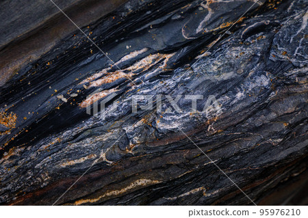 Rocky shapes on the beach. textures and patterns generated on the stones of the Asturian beaches 95976210