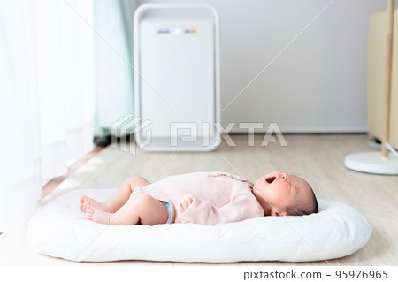 Baby yawning in the living room Air purifier 95976965