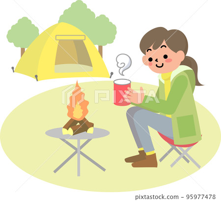 坐在戶外篝火前的年輕女子 坐在戶外篝火前的年輕女子 95977478