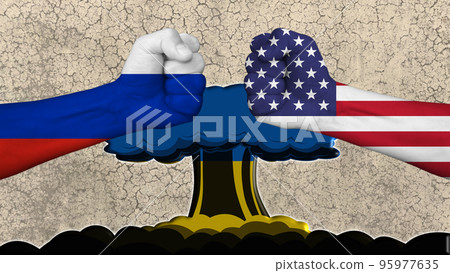 Russia vs USA, two fists with the flags of the two countries, in the center the explosion of a nuclear bomb with the flag of Ukraine. In the background a concrete wall 95977635