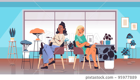 young arguing women not speaking to each other generation Z lifestyle concept young arguing women not speaking to each other generation Z lifestyle concept 95977889