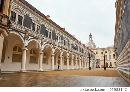 The territory of the old horse yard. The architecture of the building with a colonnade along the entire facade in the Baroque style The territory of the old horse yard. The architecture of the building with a colonnade along the entire facade in the Baroque style 95983142
