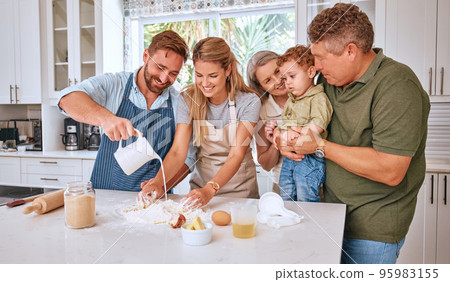 Grandparents, parents and child baking in kitchen together making sweet treats for family. Love, bonding and big family together teaching, learning and making food with young boy in family home 95983155