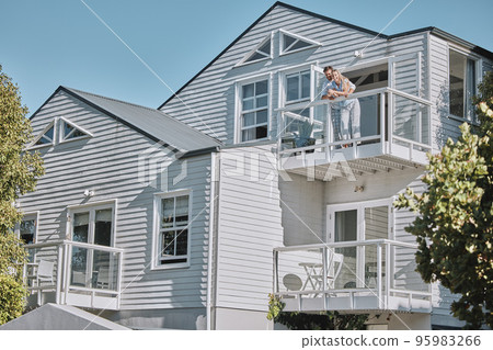 Real estate, house and couple relax on balcony of their dream home, happy, proud and laughing. Property, family and happy man, woman and homeowners enjoy conversation, joke and terrace view together Real estate, house and couple relax on balcony of their dream home, happy, proud and laughing. Property, family and happy man, woman and homeowners enjoy conversation, joke and terrace view together 95983266
