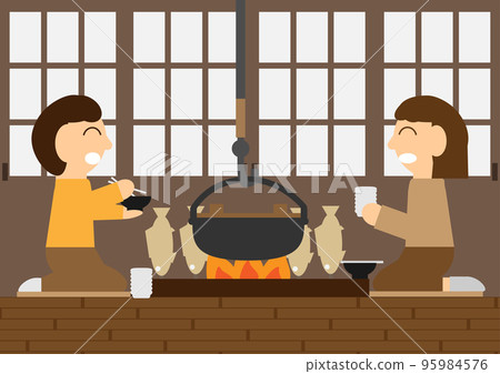 People eating around the hearth 95984576
