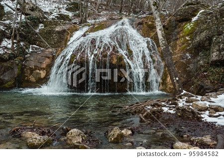 Diferent cascades of Djur-Djur waterfall on Ulu-Uzen river in early spring. Khapkhalskiy canyon in Crimea 95984582