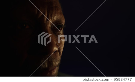 Close-up sad black male eyes 95984777