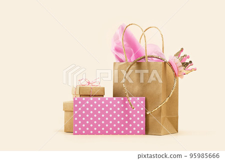 Golden crown headband for little princess. Gift or Sale concept. Shopping buff paper bag, with pink tissue. Polka dot gift card. Holiday birthday. Packaging. order delivery. baby shower for girl 95985666