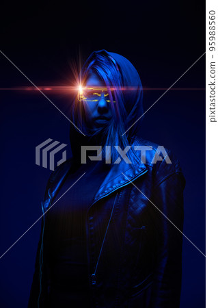 Woman is using augmented reality headset. Concept of virtual, augmented and extended reality. 95988560