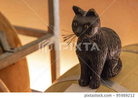 Black cat (schwarze katze) as a symbol of best wine in typical Austrian wine cellar Black cat (schwarze katze) as a symbol of best wine in typical Austrian wine cellar 95989212