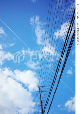 Blue sky and power pole and electric wire Blue sky and power pole and electric wire 95989893
