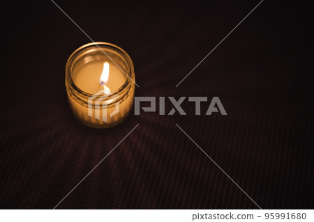 Candle flame warm light Candle flame warm light 95991680