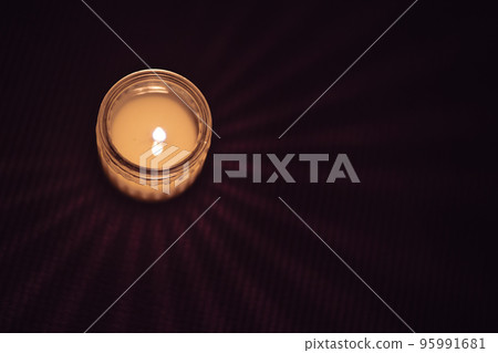 Candle flame warm light Candle flame warm light 95991681