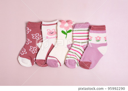 Colorful baby kid socks , different print color for boy and girl. Cloth textile. Colorful baby kid socks , different print color for boy and girl. Cloth textile. 95992290