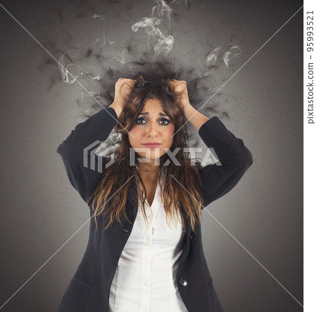 Stressed and desperate businesswoman 95993521