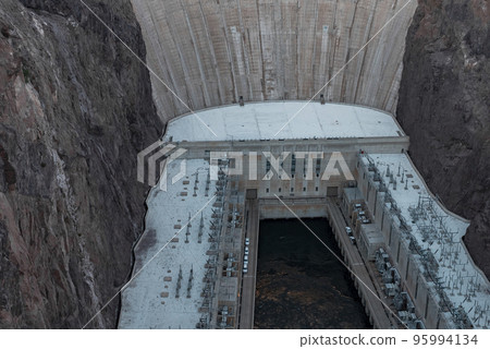 Aerial View Of Hoover Dam Amidst Majestic Canyon In Nevada 95994134