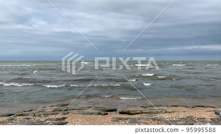 white foam on green sea waves white foam on green sea waves 95995588