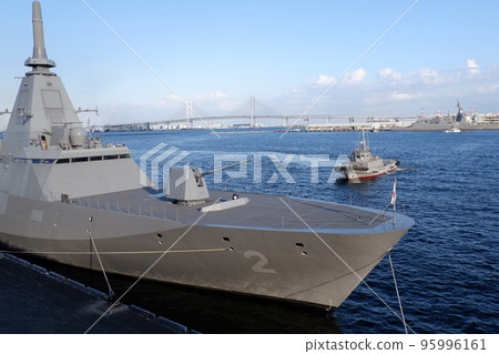 Escort ship Kumano departing from port 95996161