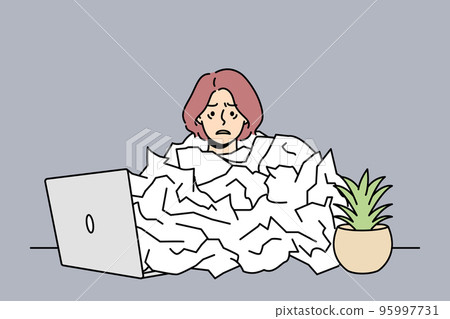 Tired female employee overwhelmed with paper work Tired female employee overwhelmed with paper work 95997731