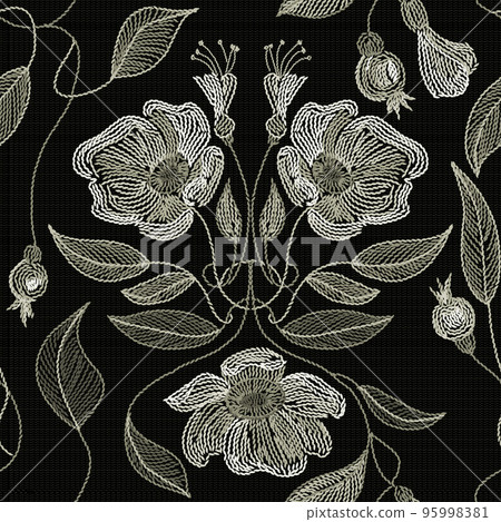 Embroidered flowers and leaves ornament on a dark background. 95998381