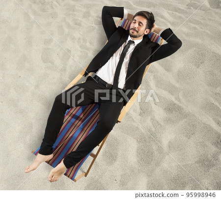 Businessman needs a vacation 95998946