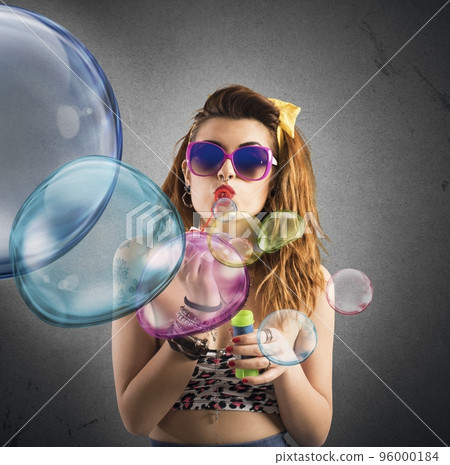 Blowing colored bubbles 96000184