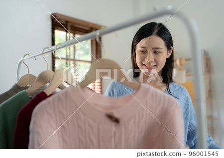 Young person using credit card and laptop computer. Online shopping, e-commerce concept Young person using credit card and laptop computer. Online shopping, e-commerce concept 96001545