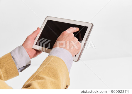 Image of male hands typing on table isolated over white background. Information search, online business, remote control 96002274