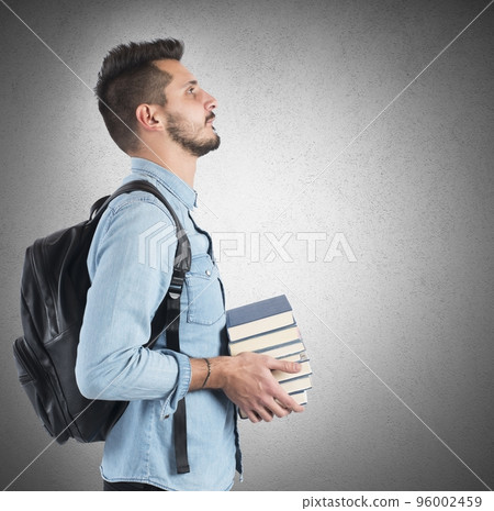 Student studying to achieve objectives Student studying to achieve objectives 96002459