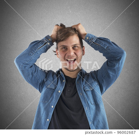 Boy shouting desperately 96002687