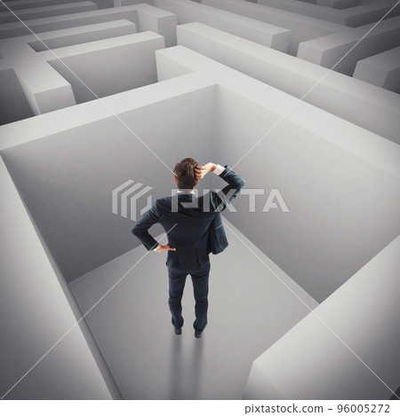 Businessman lost in a maze 96005272