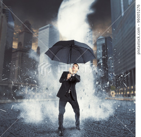 Businessman against ice flow 96005276