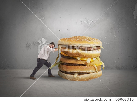 Man pushes a sandwich Man pushes a sandwich 96005316
