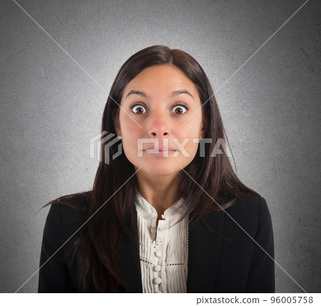 Amazed businesswoman 96005758