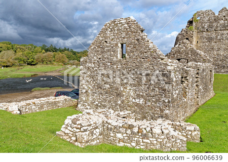 Ruins of Ogmore Castle in Vale of Glamorgan river 96006639