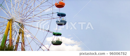 ferris wheel against the sky. Banner, copy space 96006782